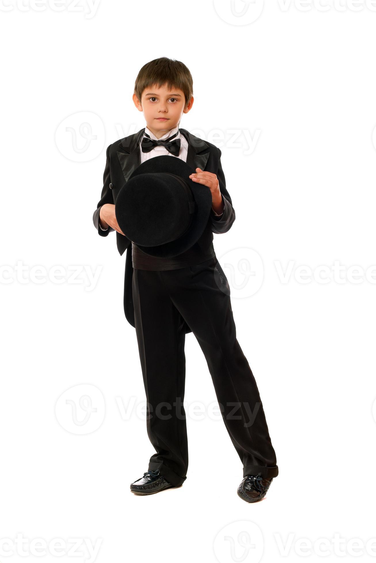 Little boy in tuxedo with a hat 18946322 Stock Photo at Vecteezy