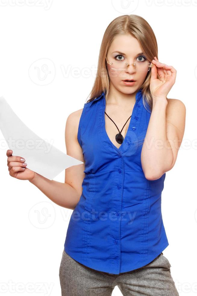 Shocked young business woman in glasses photo