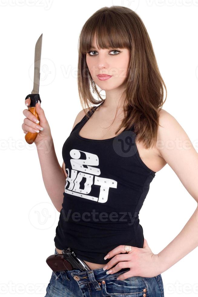 Pretty girl with a pistol and knife photo