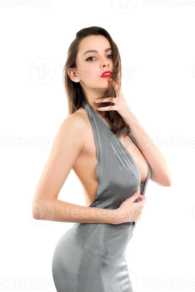 Pretty brunette in grey dress photo