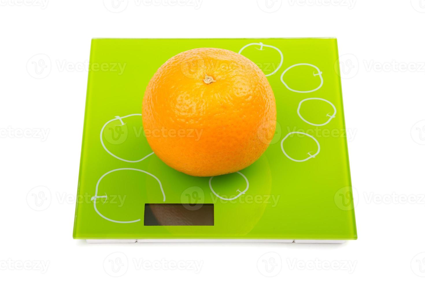 Sweet orange on scales photo