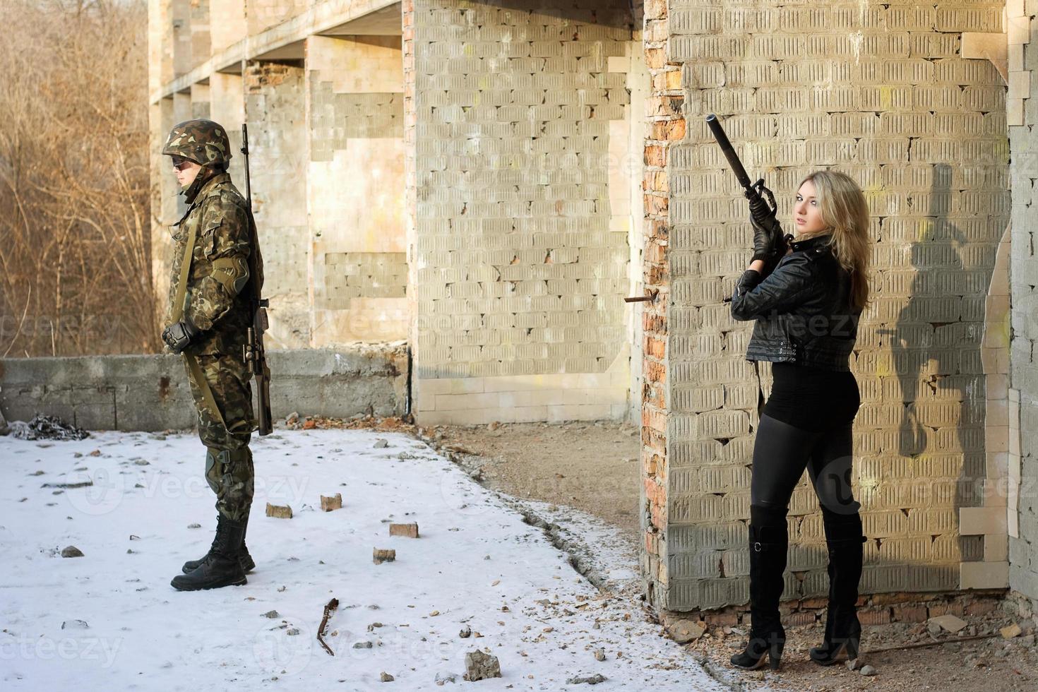 Girl aim at a guy photo