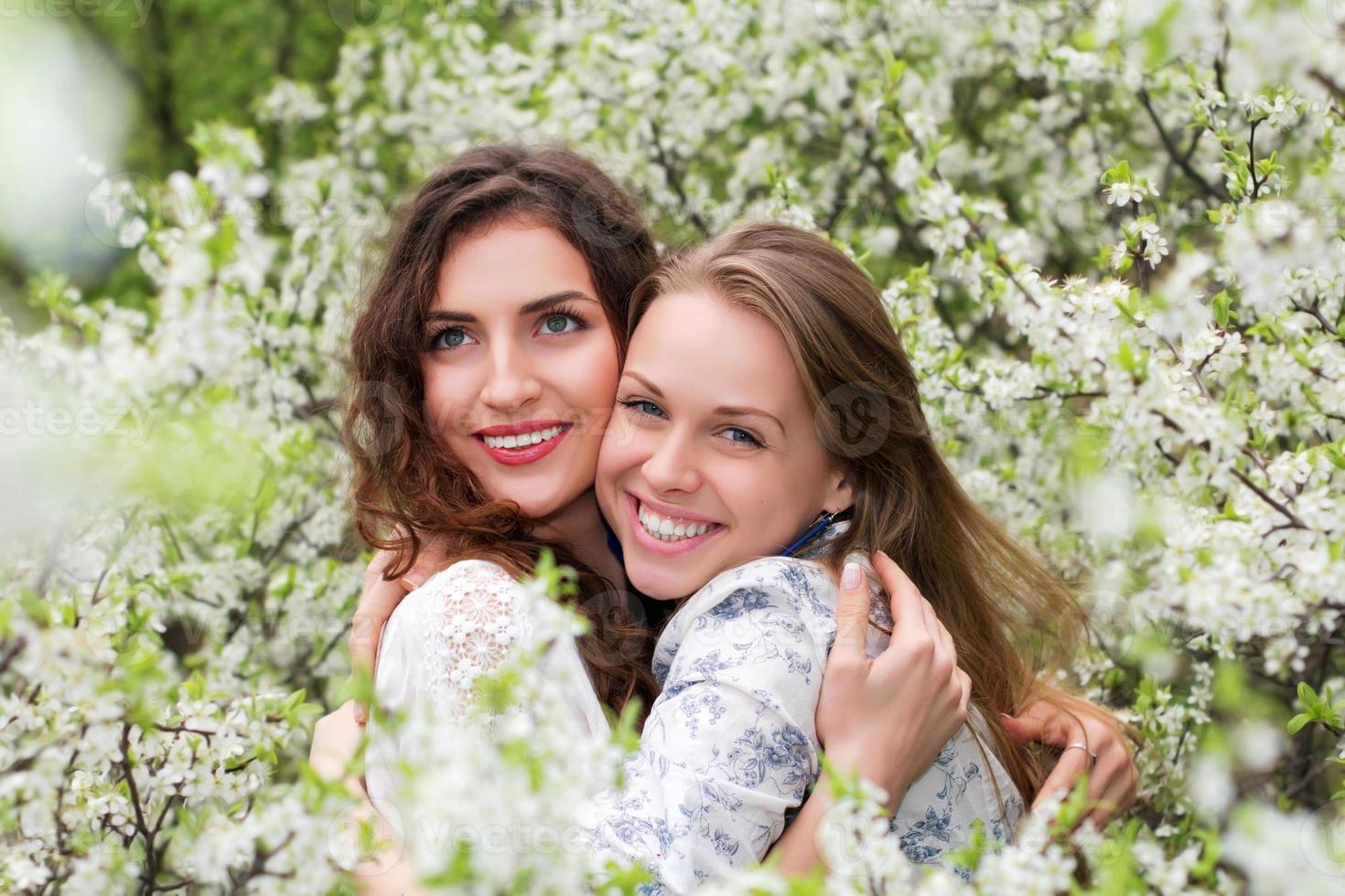 Two pretty smiling women photo