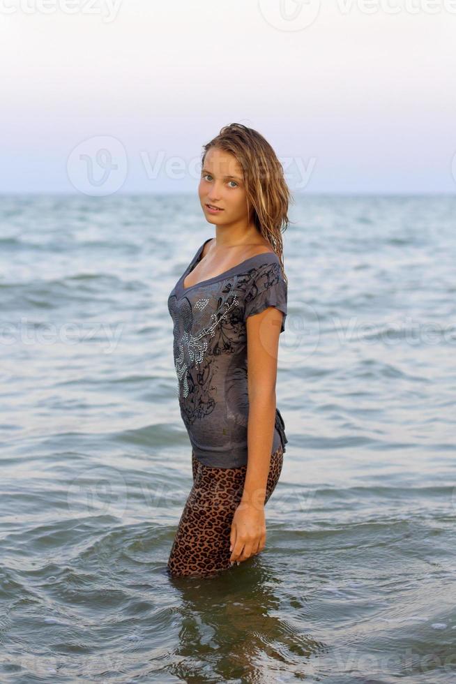 nice girl in wet clothes photo