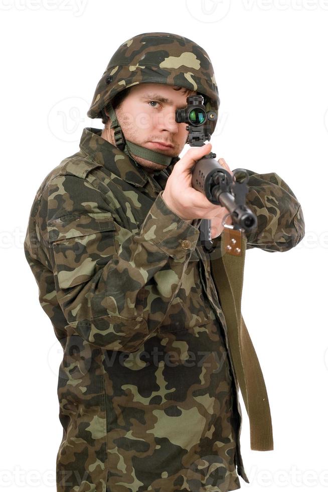Armed soldier aiming svd photo