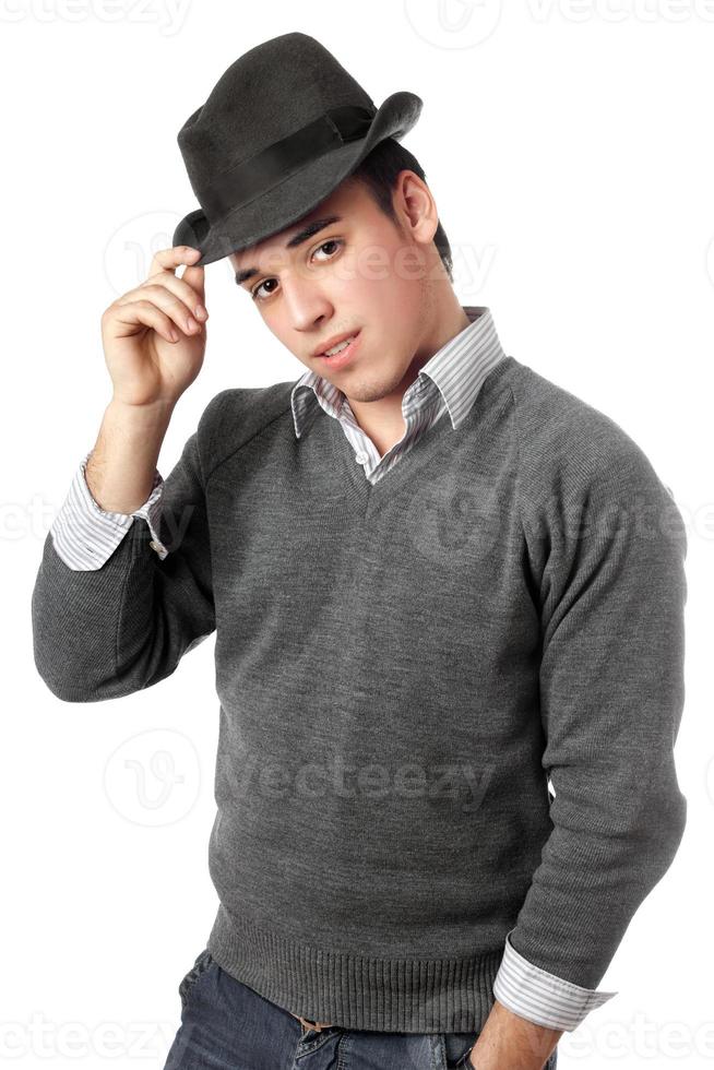 Young handsome man wearing black hat. Isolated photo