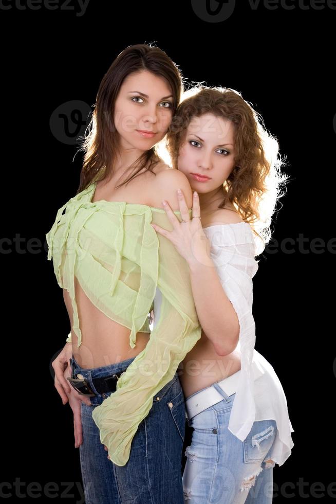 Portrait of the two sexy pretty girlfriends photo