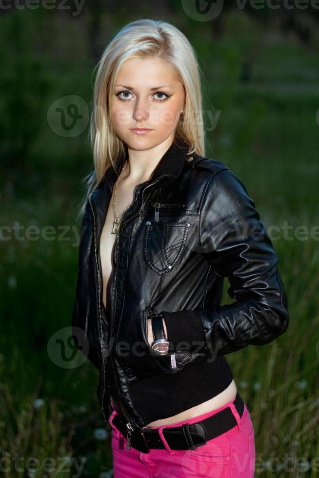 blonde in a black leather jacket photo