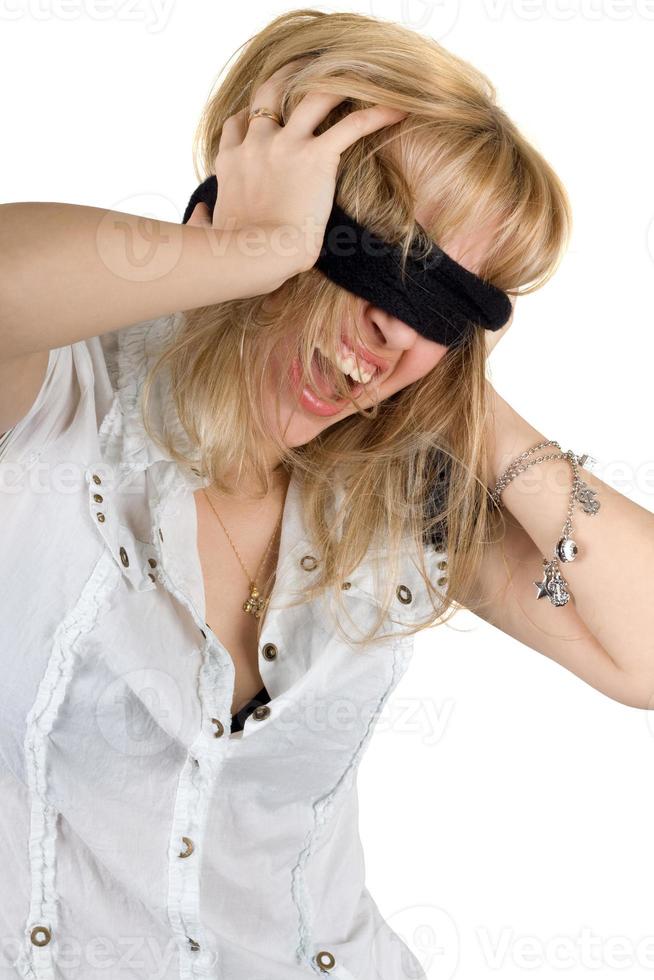 Shouting young woman blindfold. Isolated on white photo