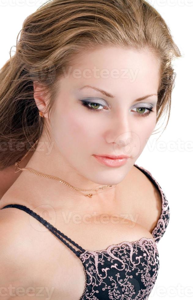 Portrait of the beautiful young woman over white photo