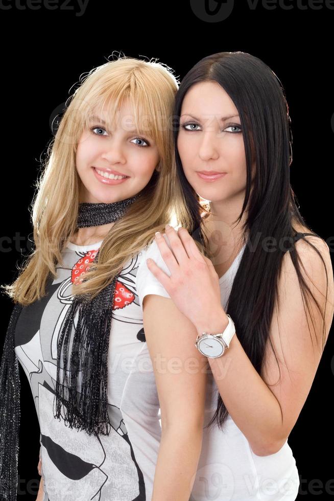 Portrait of the young brunette and blonde. Isolated photo