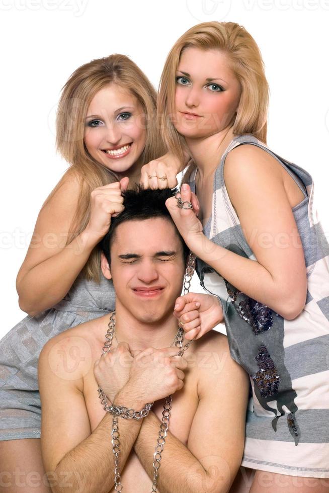 Two playful blonde and a guy in chains photo