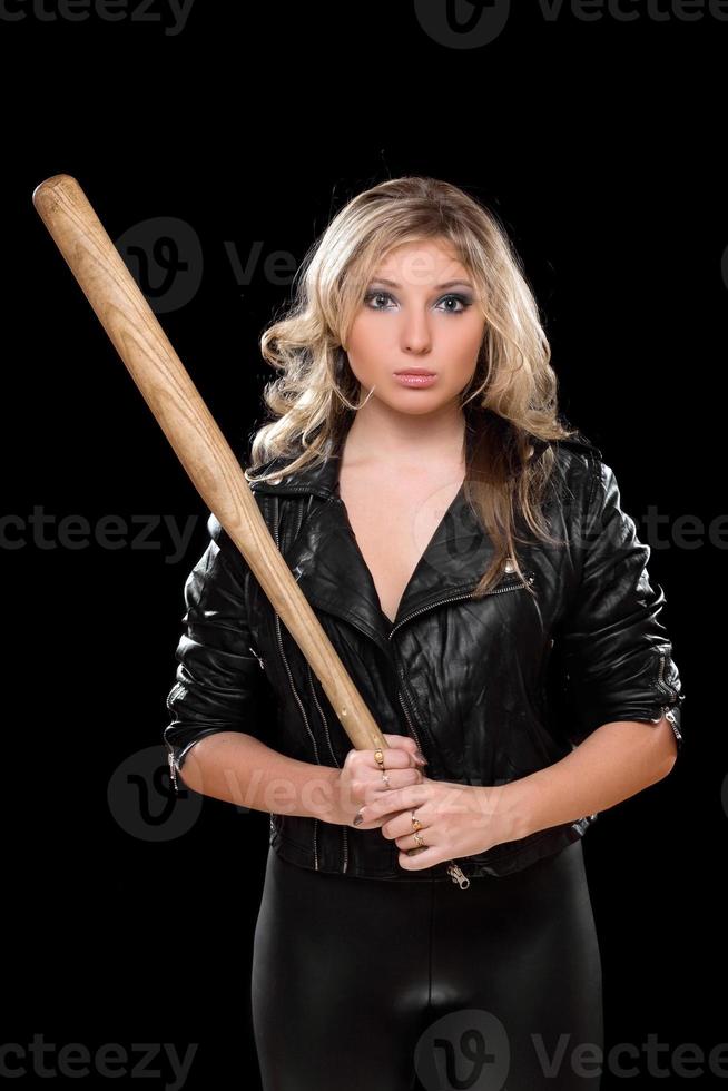 Upset girl with a bat in their hands photo