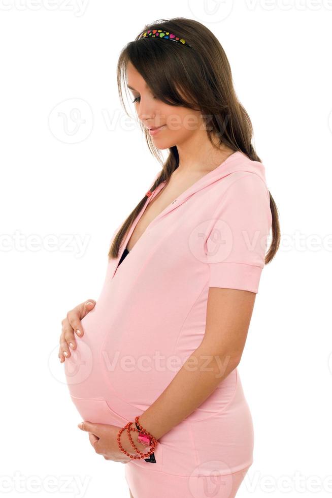 Beautiful pregnant brunette lady photo