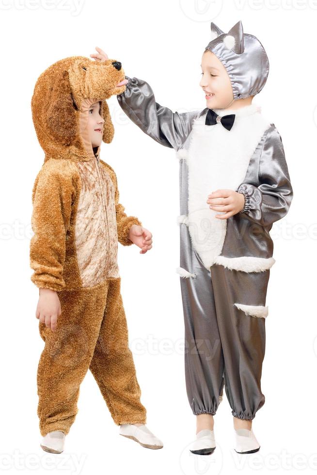 Boys dressed as a cat and dog photo