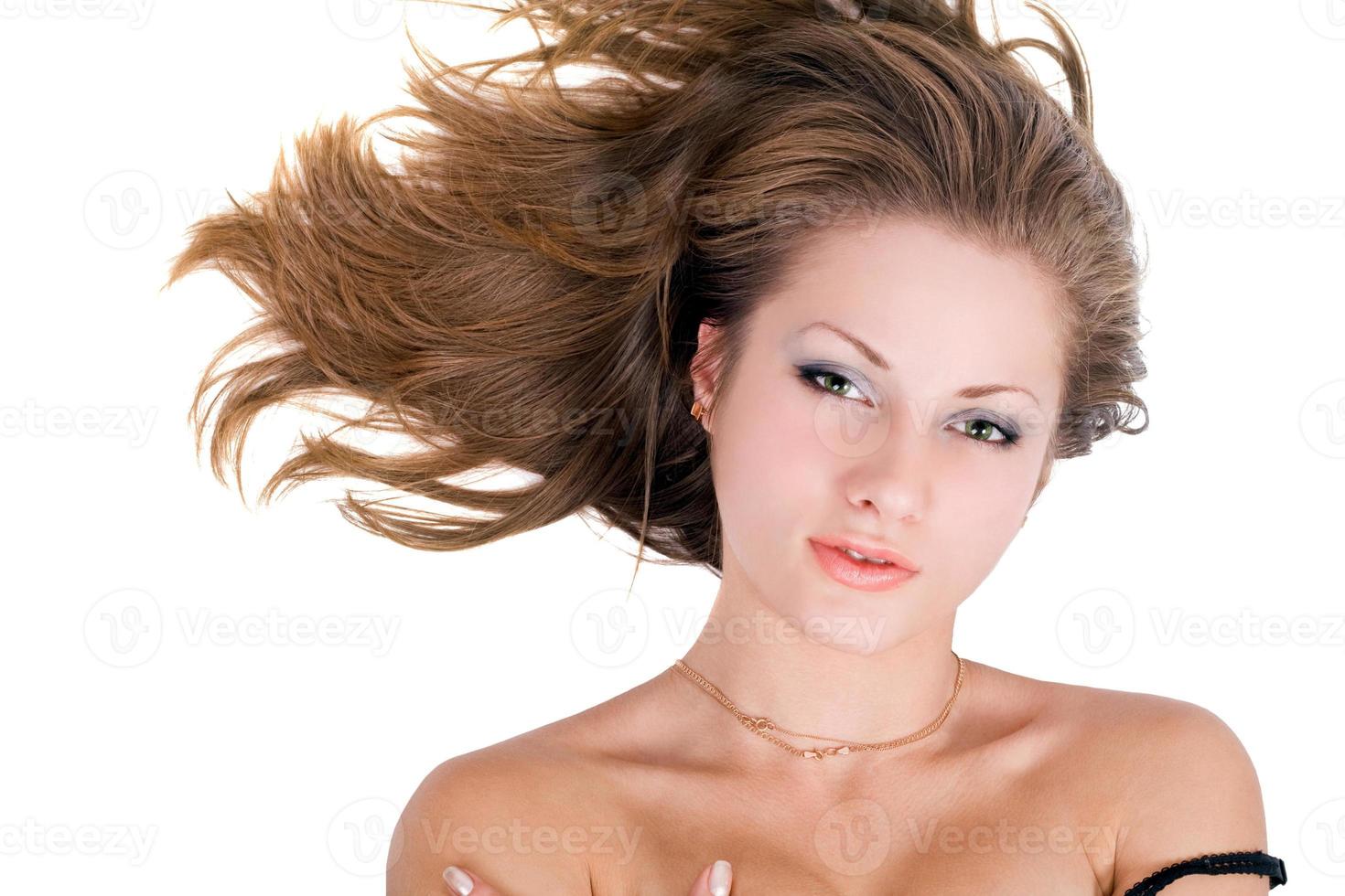 Portrait of the young beauty woman over white photo