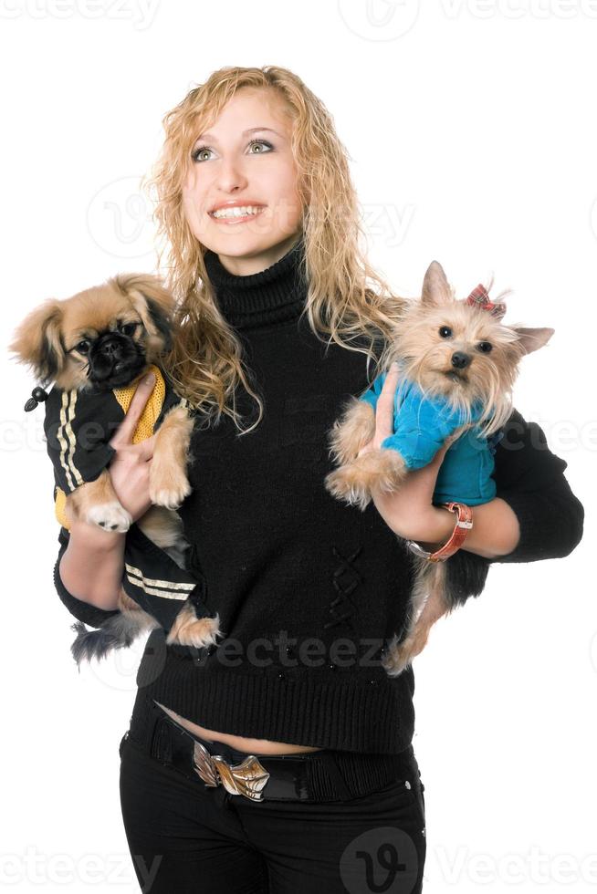Portrait of beautiful young blonde with two dogs photo