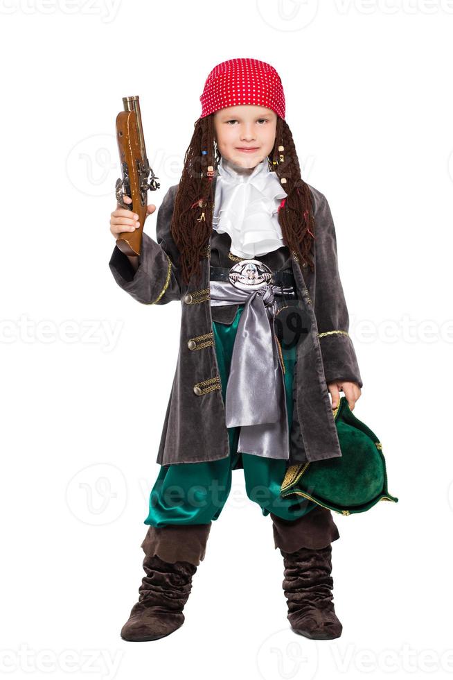 Young boy posing with a gun photo