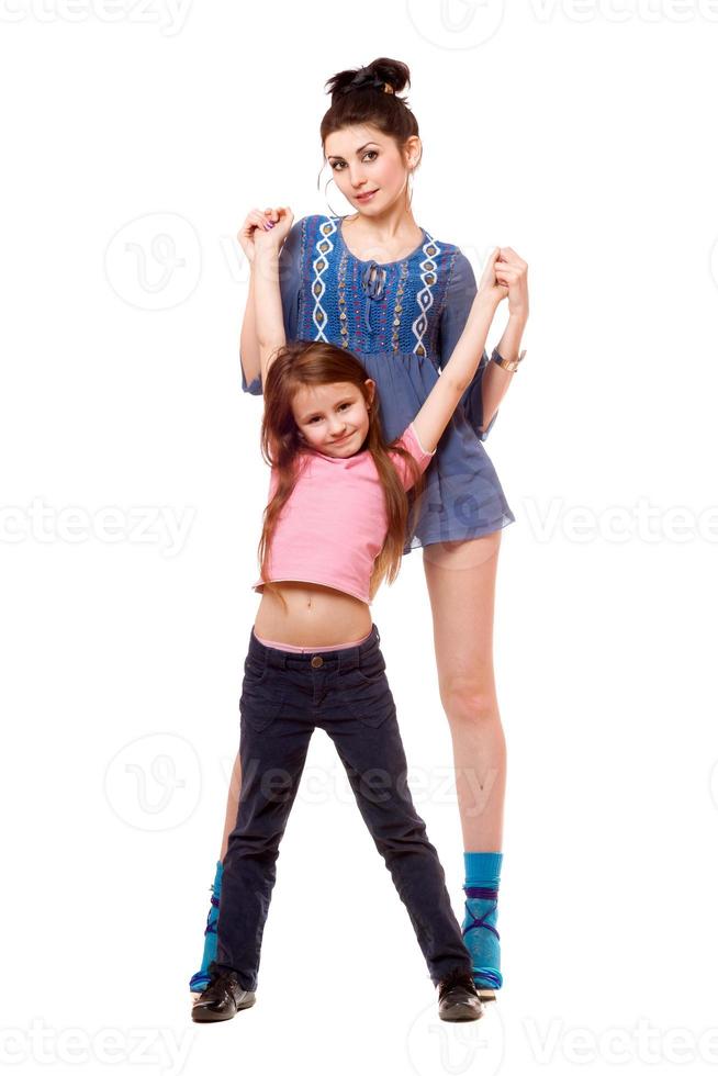 Young mother and little daughter. Isolated photo