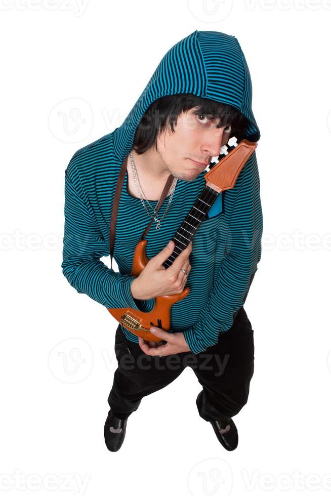 Bizarre young man with a little guitar photo