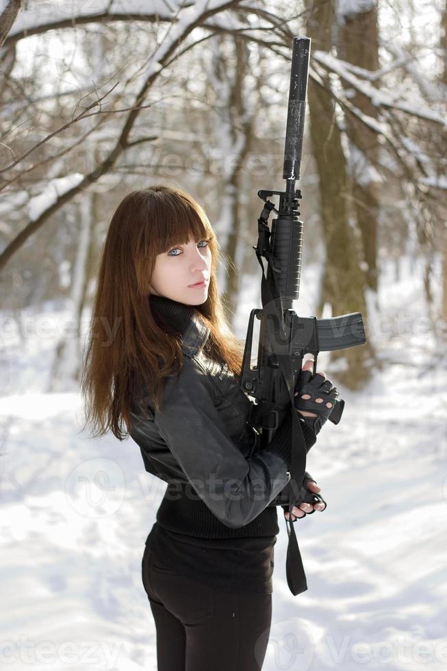 Turned lady with the gun photo