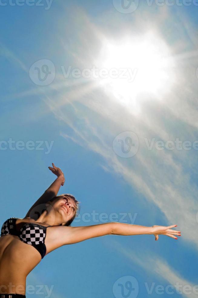 Young woman on the beach photo