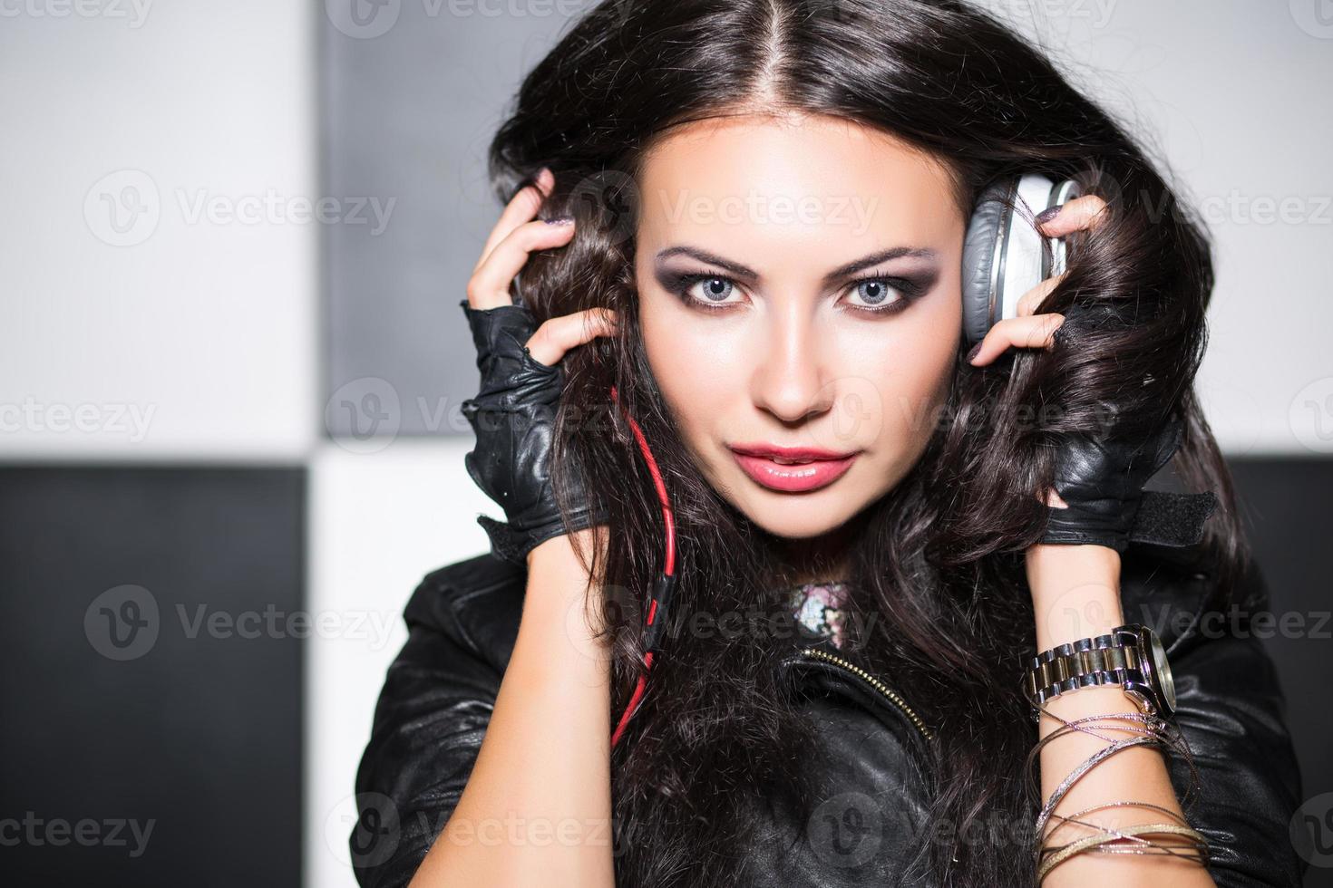 Young woman with headphones photo