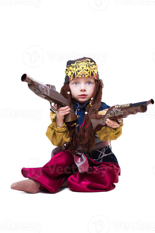 Little boy dressed as pirate photo