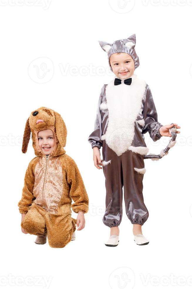Playful boys dressed as a cat and dog photo