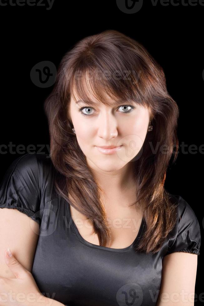 portrait of the young beauty woman. Isolated on black photo