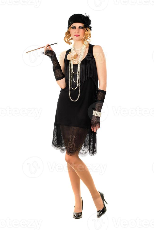 Young woman with a cigarette holder photo