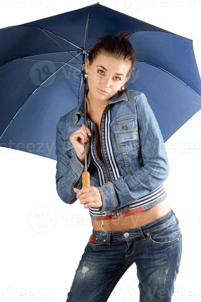 Lovely young woman in a denim suit photo