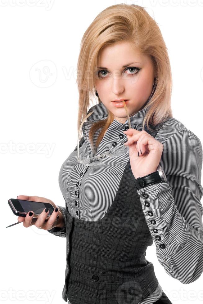 Portrait of young blonde with smartphone. Isolated photo