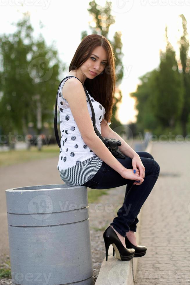 attractive young woman outdoors photo