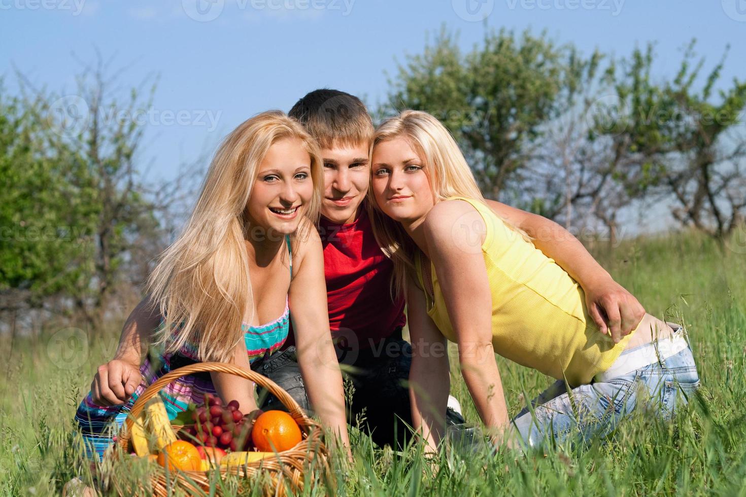 Two pretty blonde and young man photo