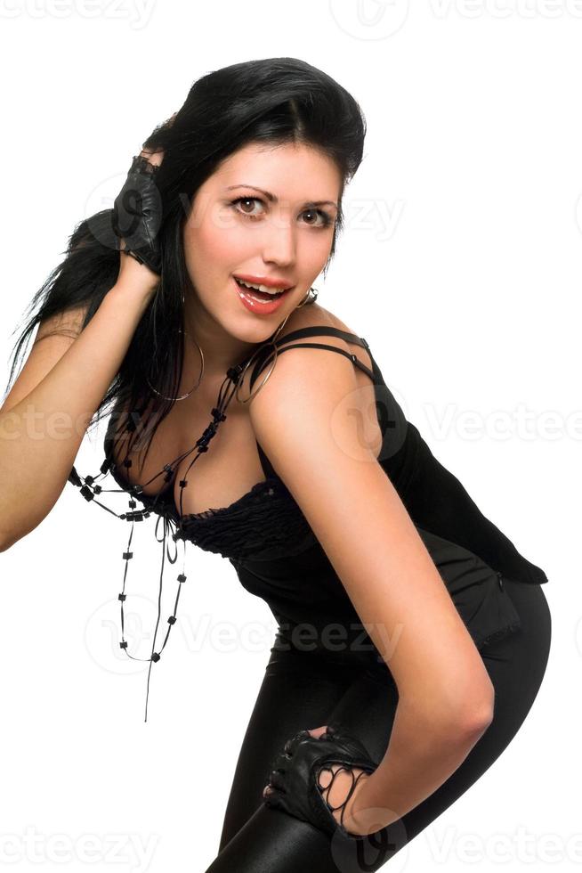 Portrait of a smiling brunette in black clothes photo