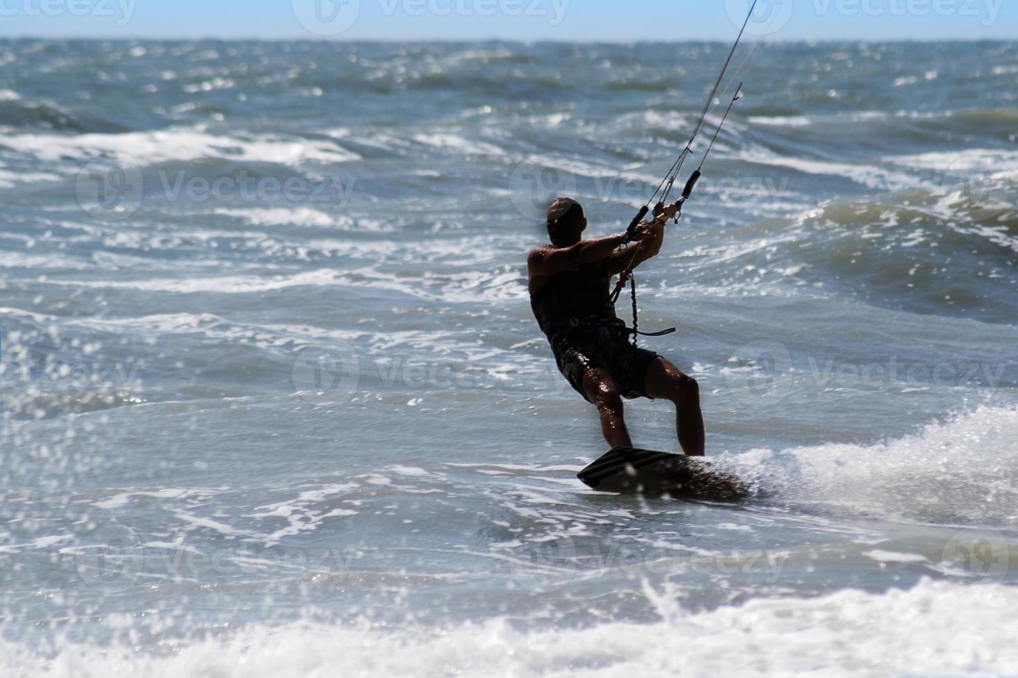 Kite surfer silhouette photo