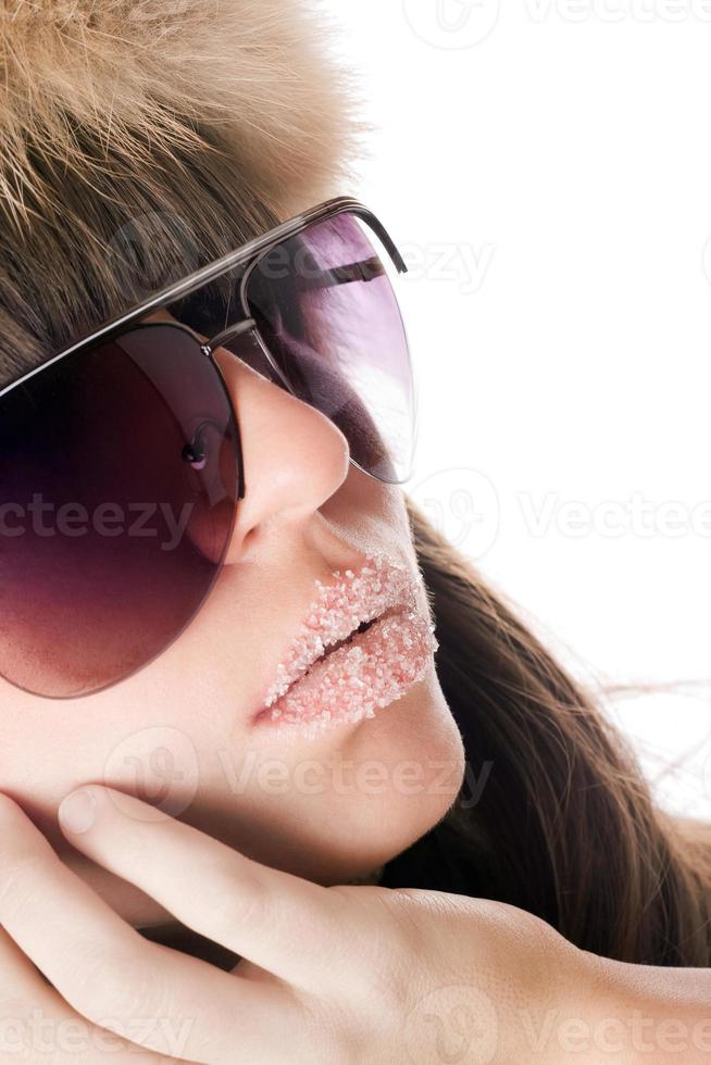 lady wearing sunglasses with sugar lips photo