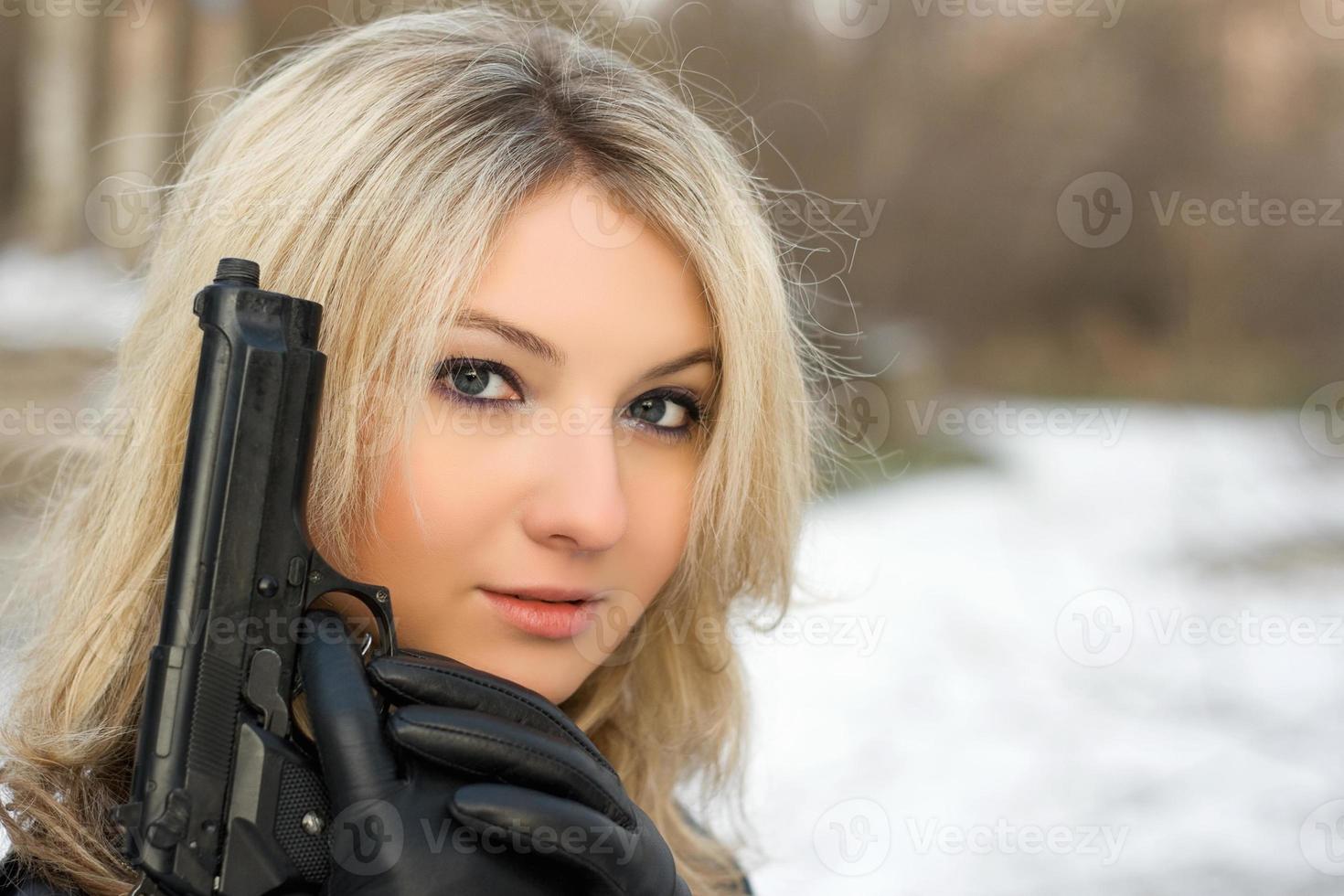 Sweet woman with a weapon photo