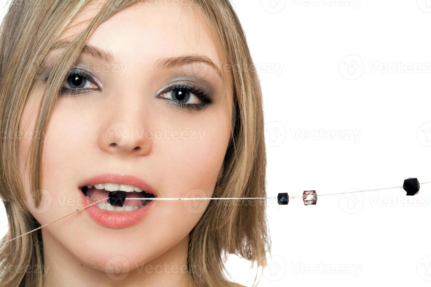 Close-up portrait of pretty young woman photo