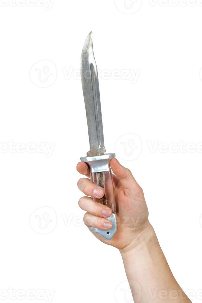 Knife in a hand. Isolated on white photo