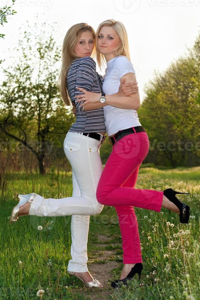 Two playful attractive blonde photo