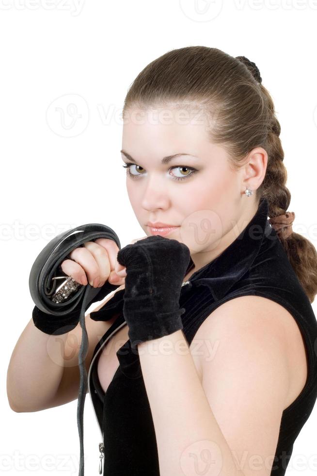 Pretty young angry woman throwing a punch over white photo