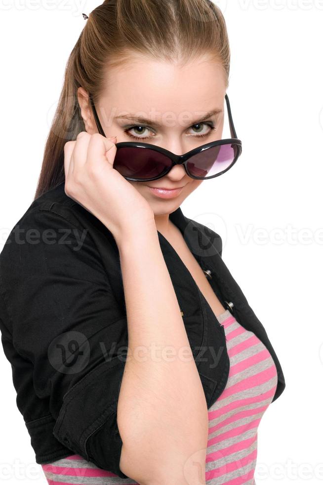 Portrait of pretty young woman in sunglasses photo