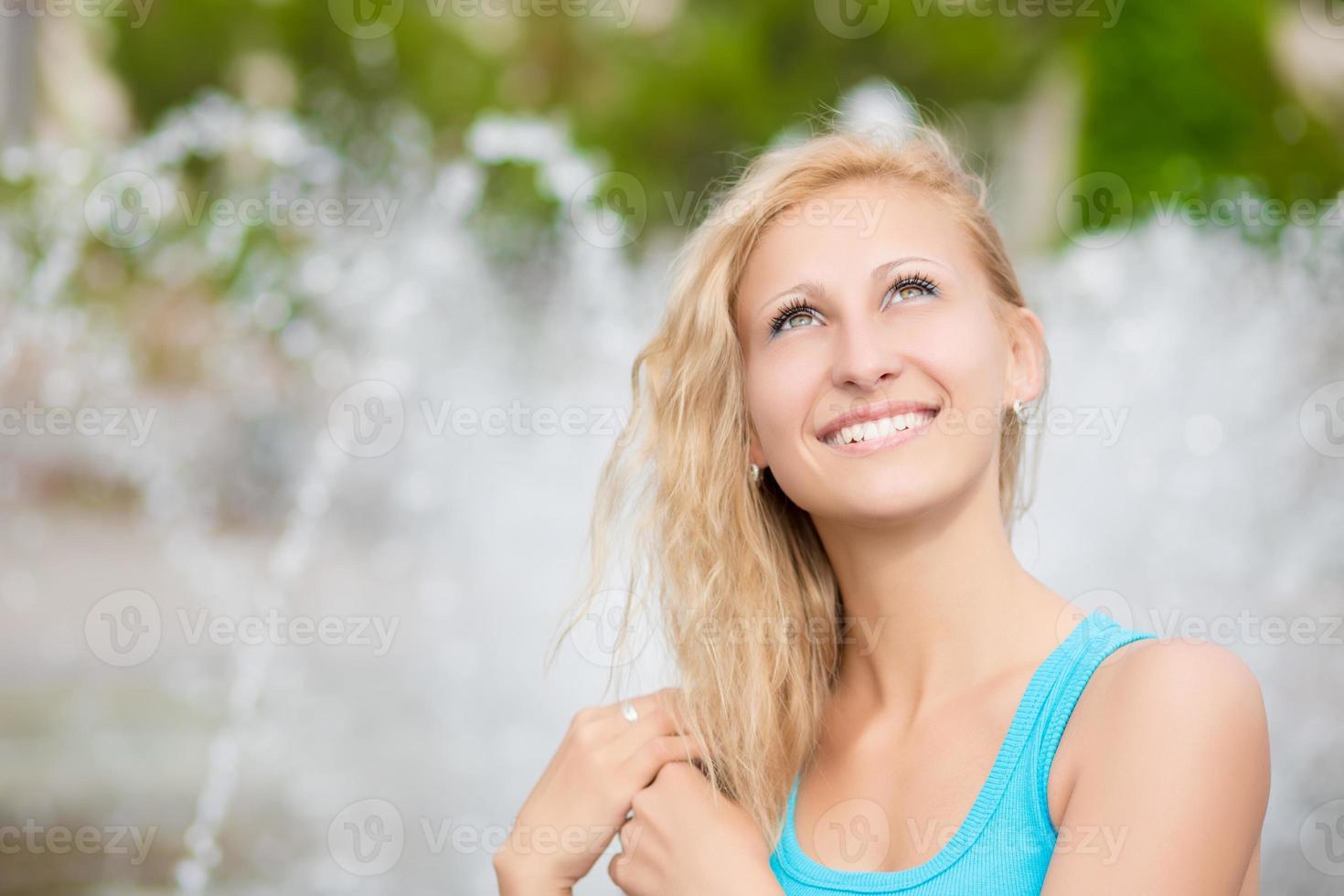 Pretty smiling blond photo