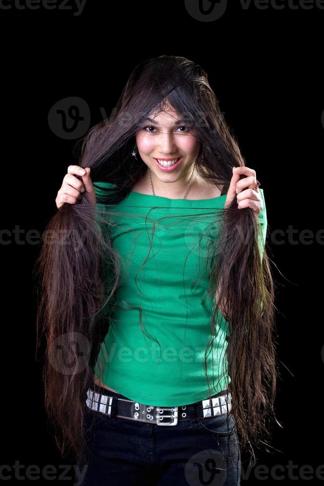 Brunette woman with long hair posing photo