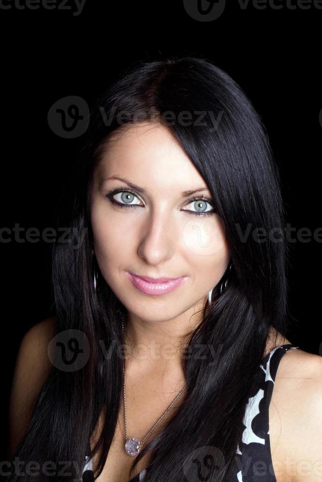 portrait of the beauty young woman. Isolated on black photo