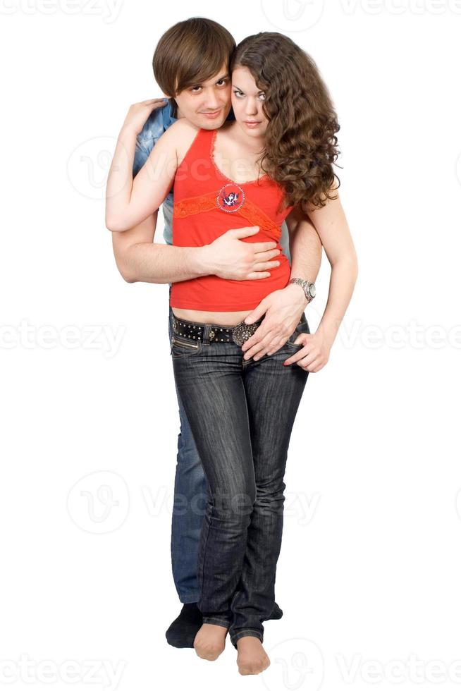 la joven pareja Aislado en un fondo blanco foto