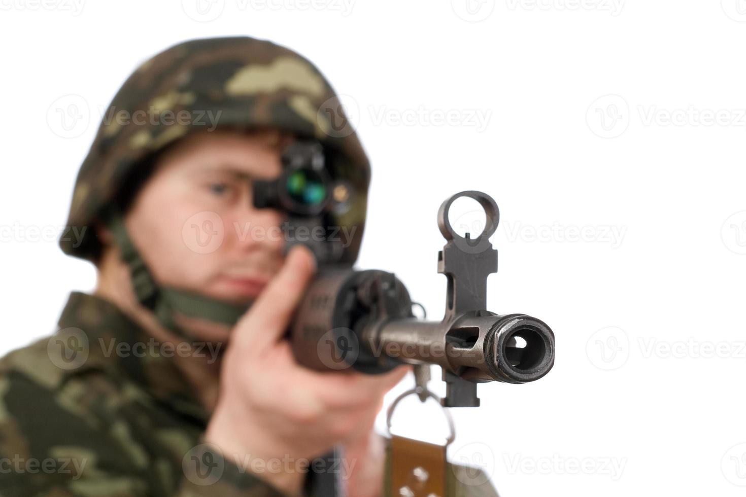 Armed soldier holding svd photo
