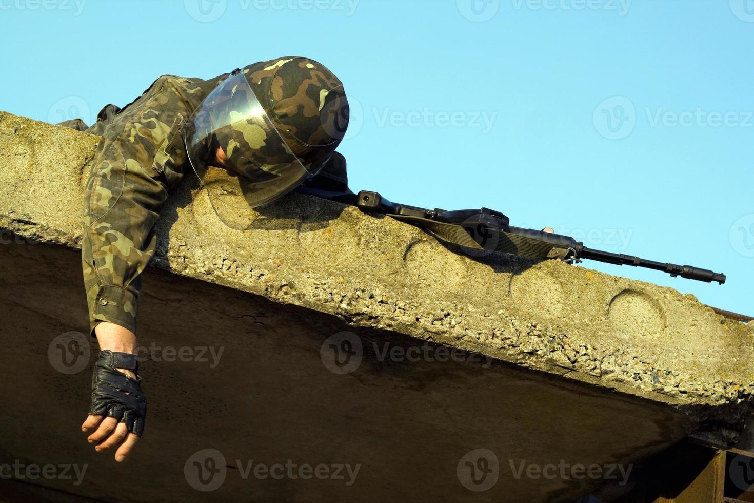 Army soldier with machine gun photo